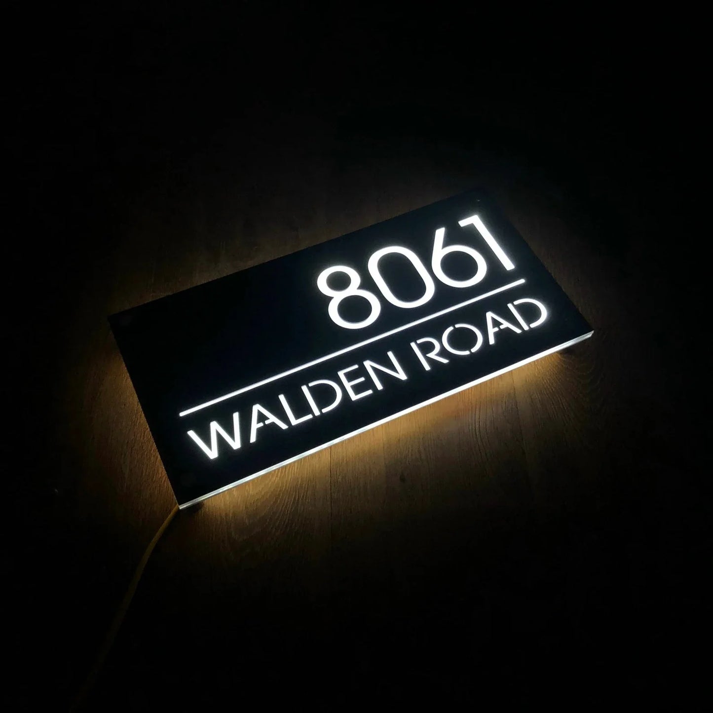 Placa LED personalizada para el número de la puerta